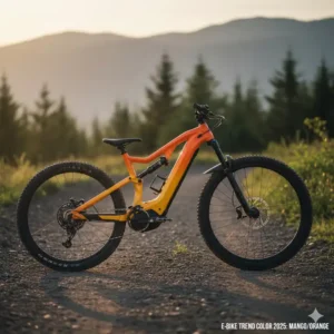 Seitenansicht eines sportlichen E-Mountainbikes (E-MTB) in leuchtendem e bike trend farben 2025 Mango/Orange.